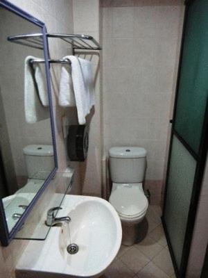 Amrise Hotel Singapura Quarto foto